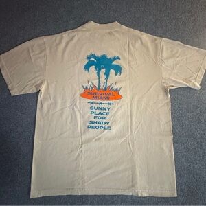 Survival Beige Graphic Tee with Blue and Orange Print